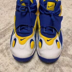 Nike Kids White, Blue, and Yellow Sneakers